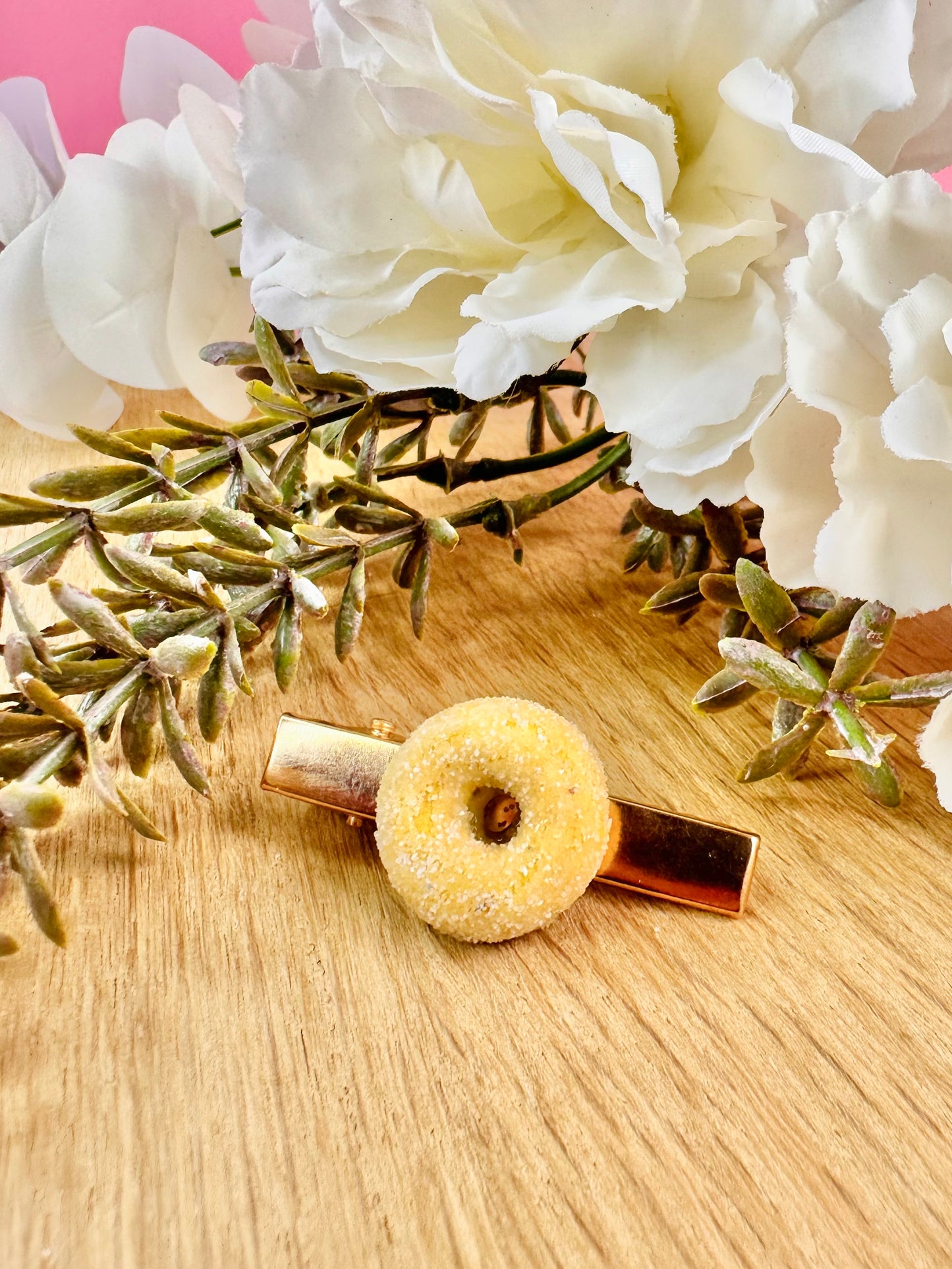 Speldje gesuikerde donut goud