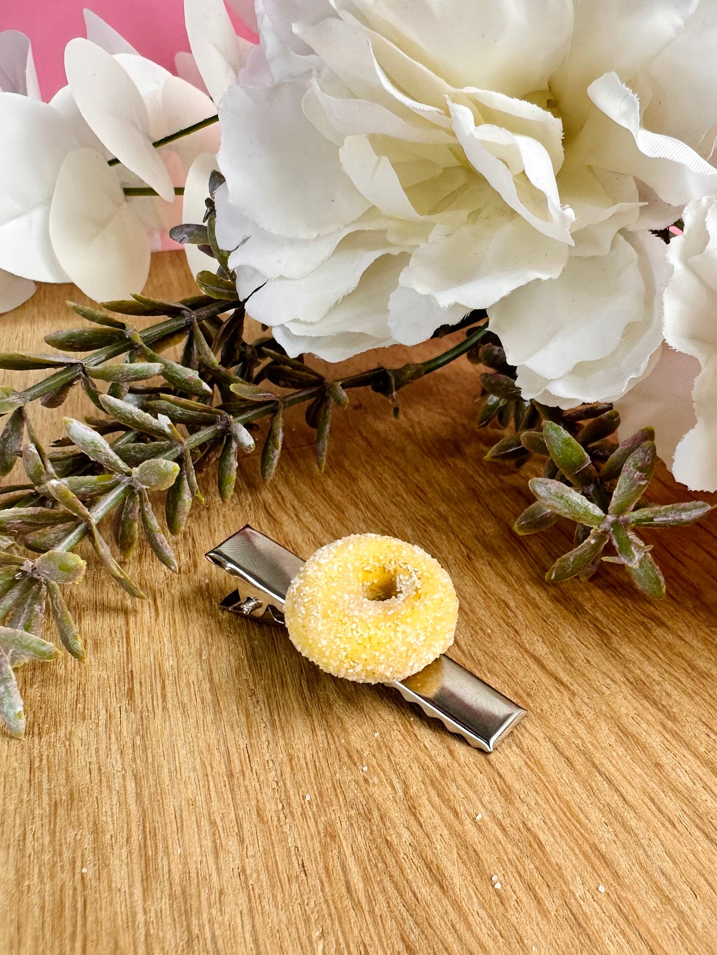 Speldje gesuikerde donut zilver