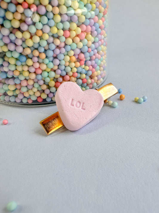 Speldje goud hartje klein 'lol' - roze