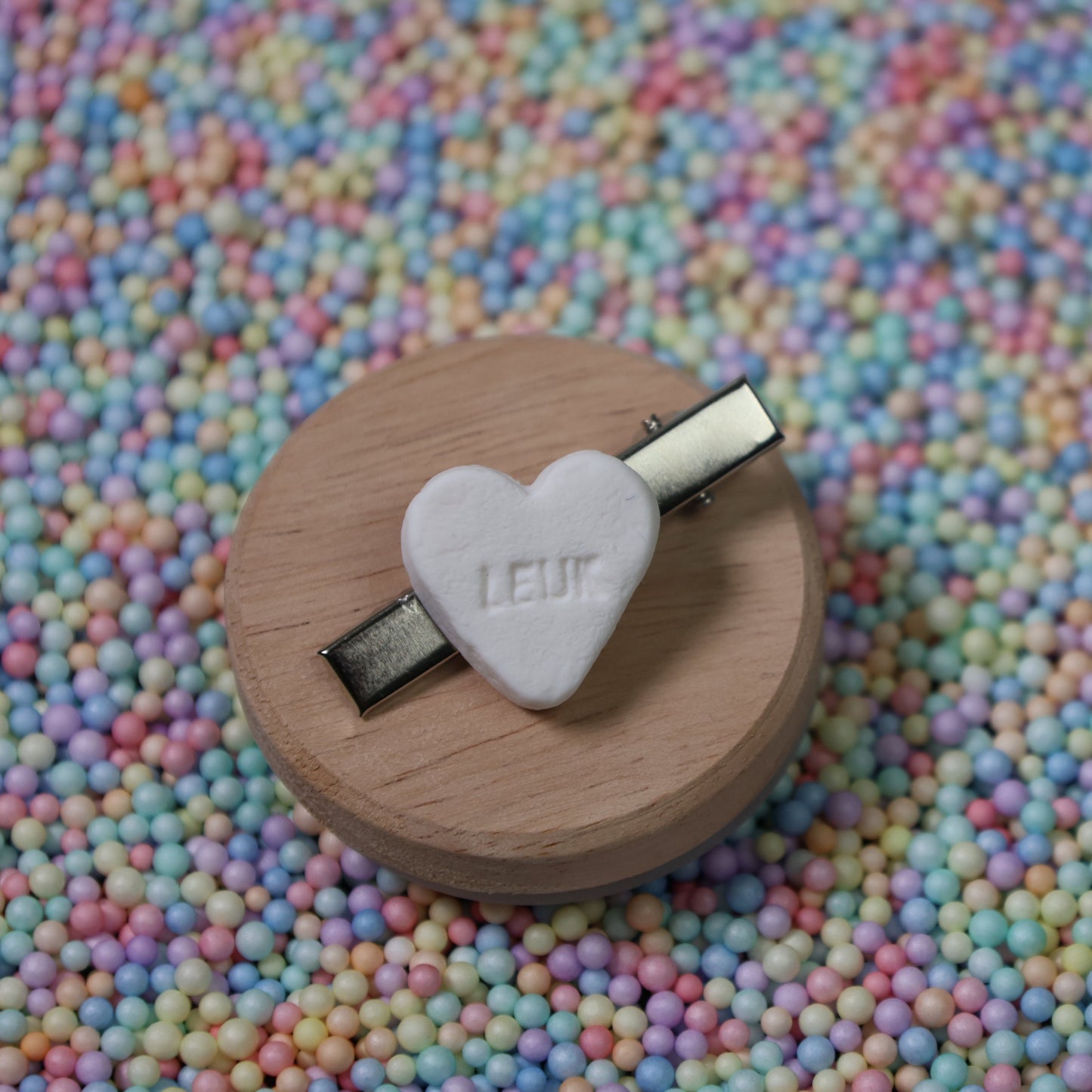 Speldje hartje klein 'leuk' - wit