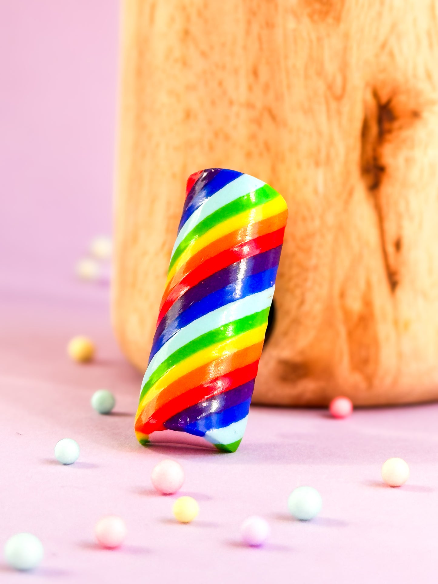 Button Regenboogzuurstok
